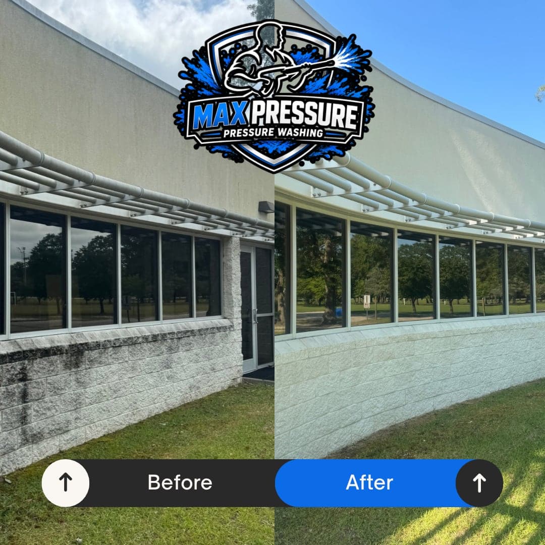 Cape Fear High School painted block wall before and after pressure washing in Fayetteville NC — black staining removed