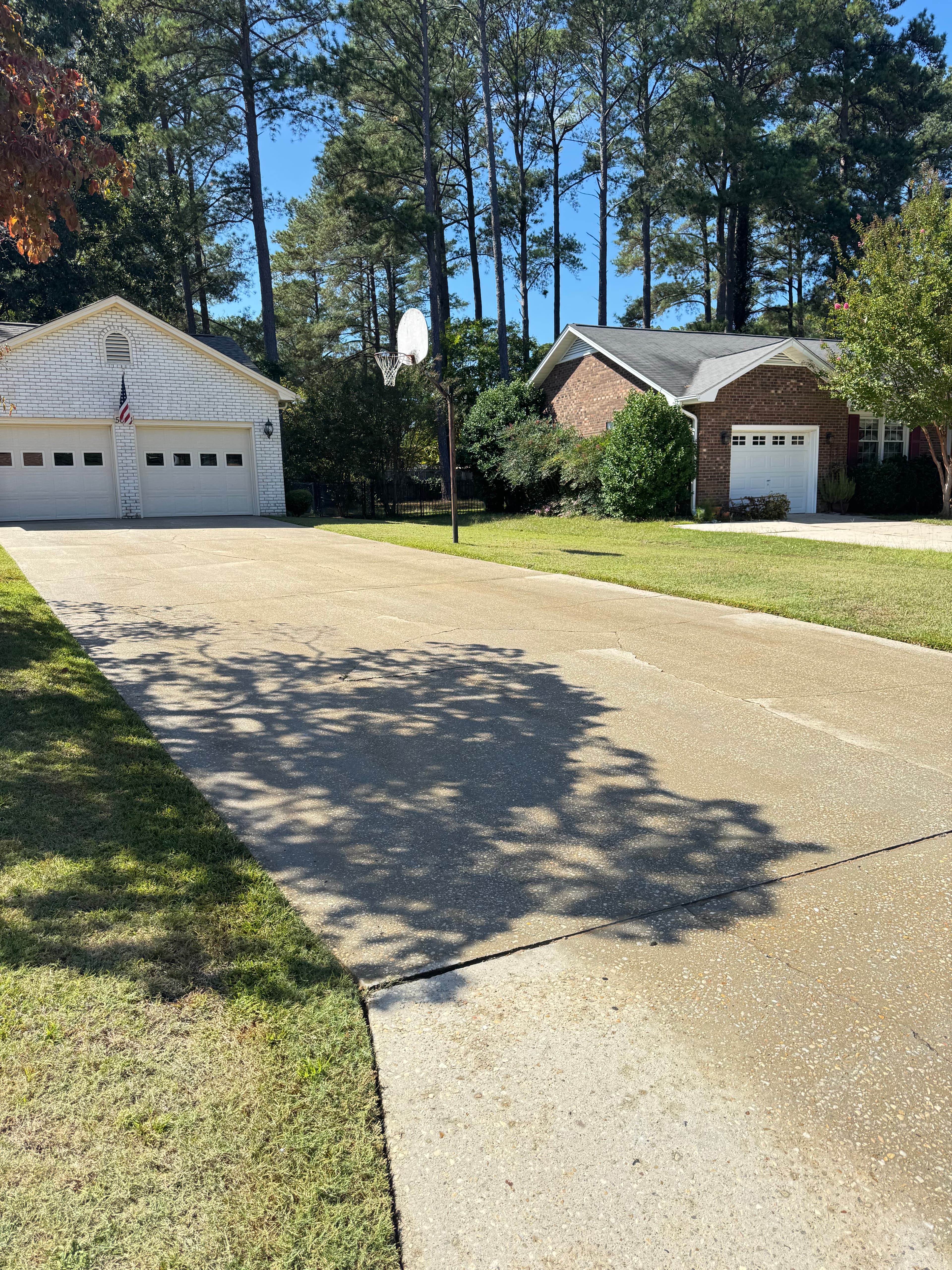 Clean concrete driveway after pressure washing by Max Pressure in Fayetteville NC
