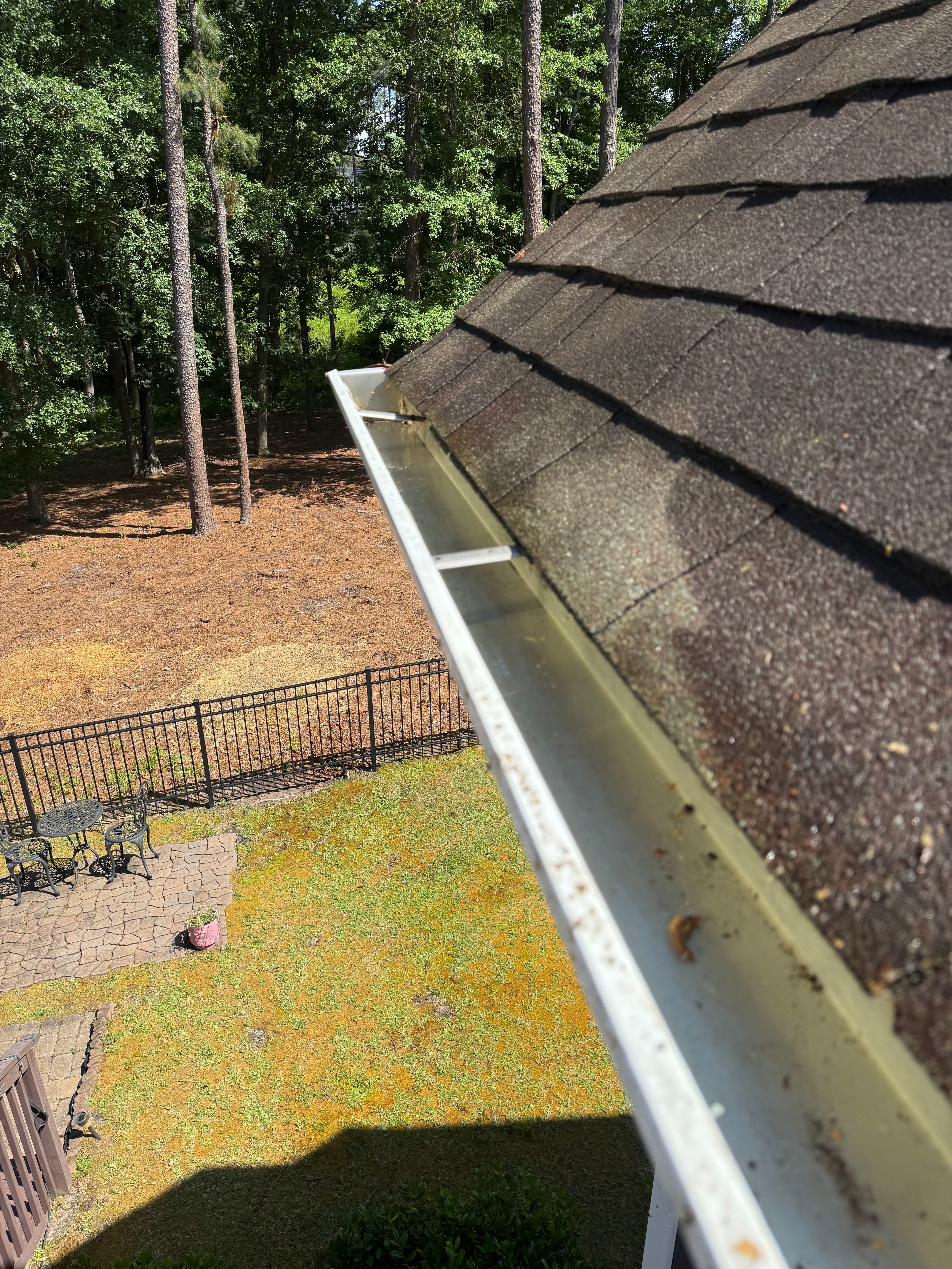 After gutter brightening by Max Pressure in Fayetteville NC — bright clean gutters