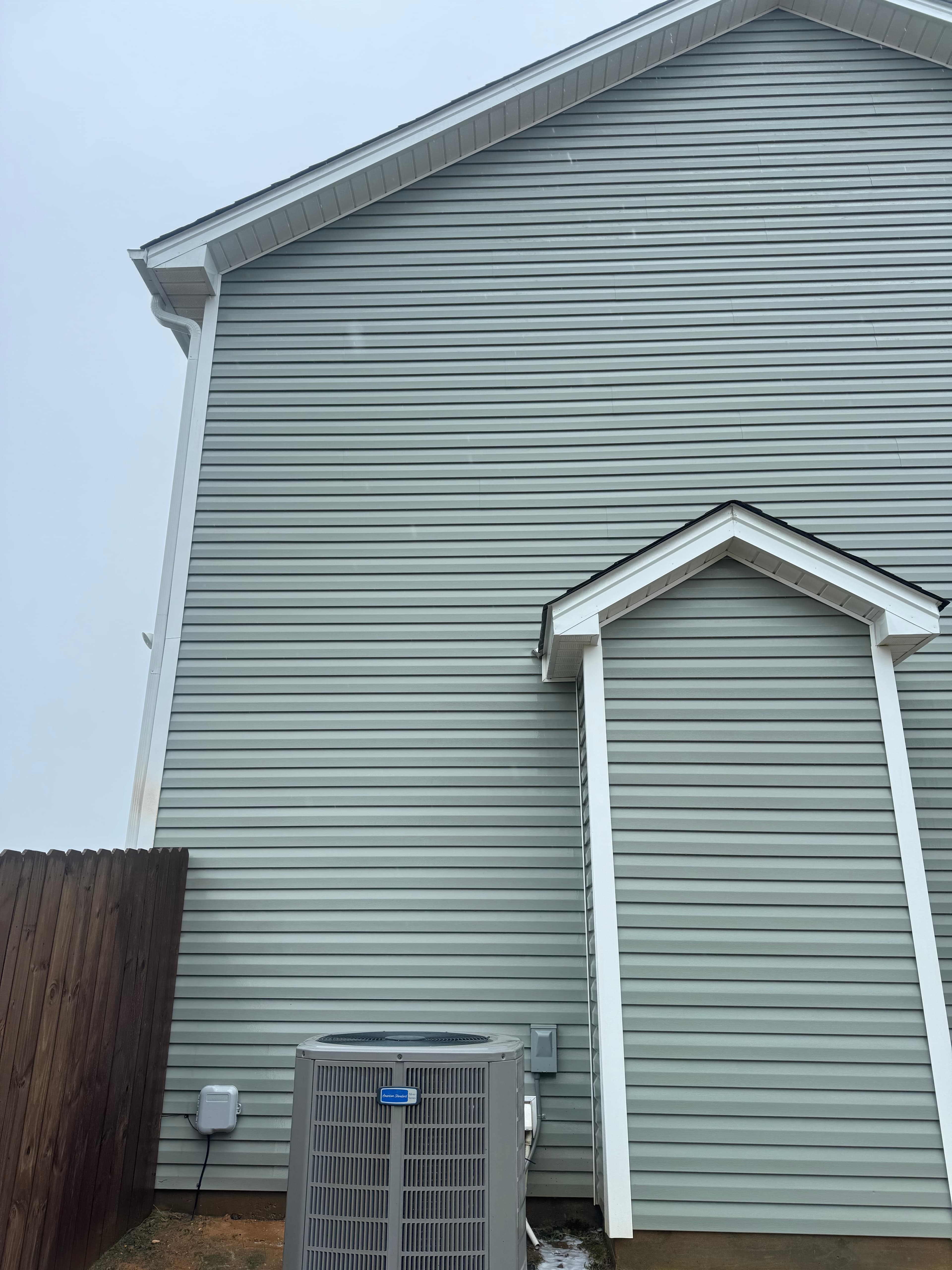 After vinyl siding soft wash by Max Pressure in Fayetteville NC — restored clean exterior