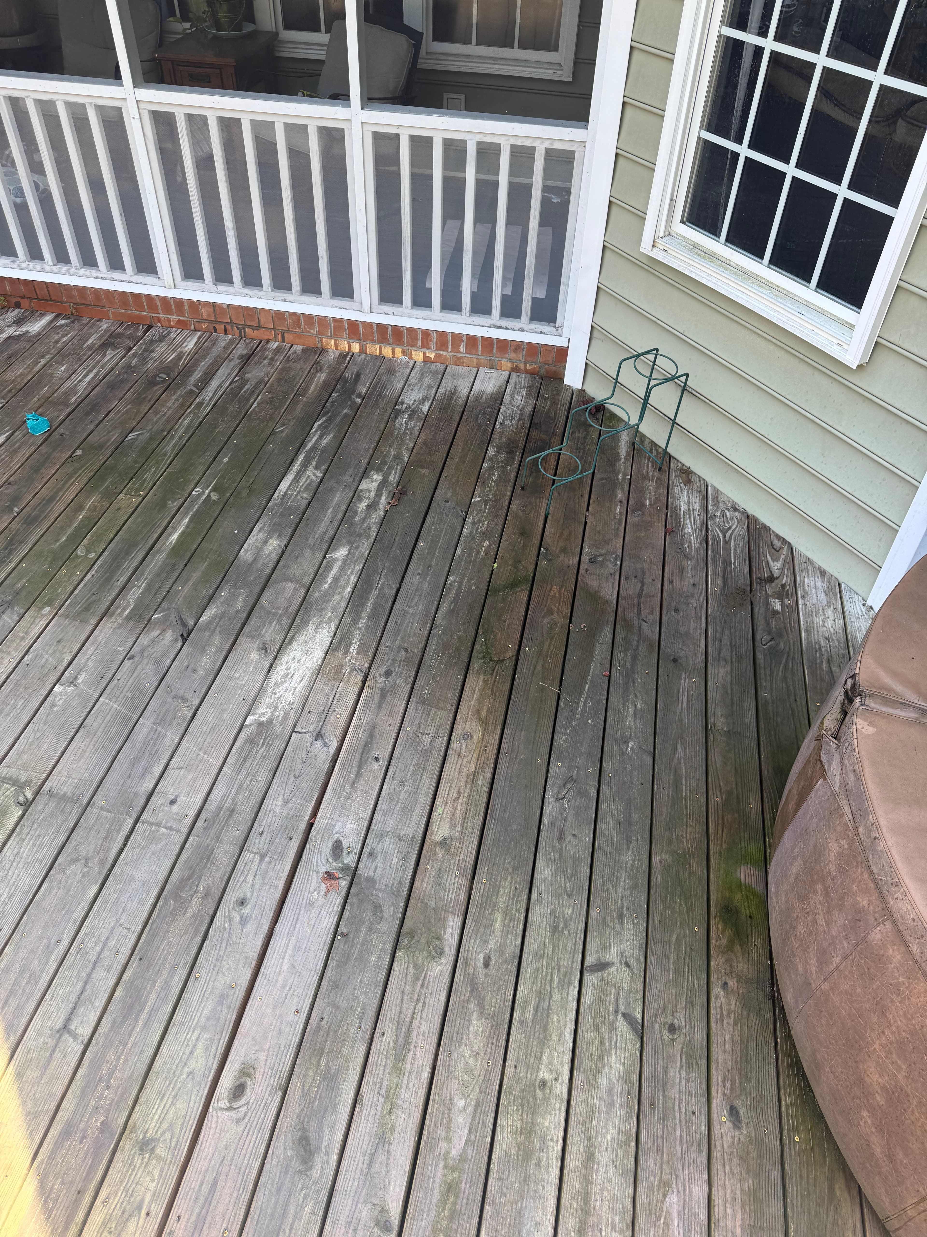 Wood deck with black mold and gray weathering in Fayetteville NC before cleaning