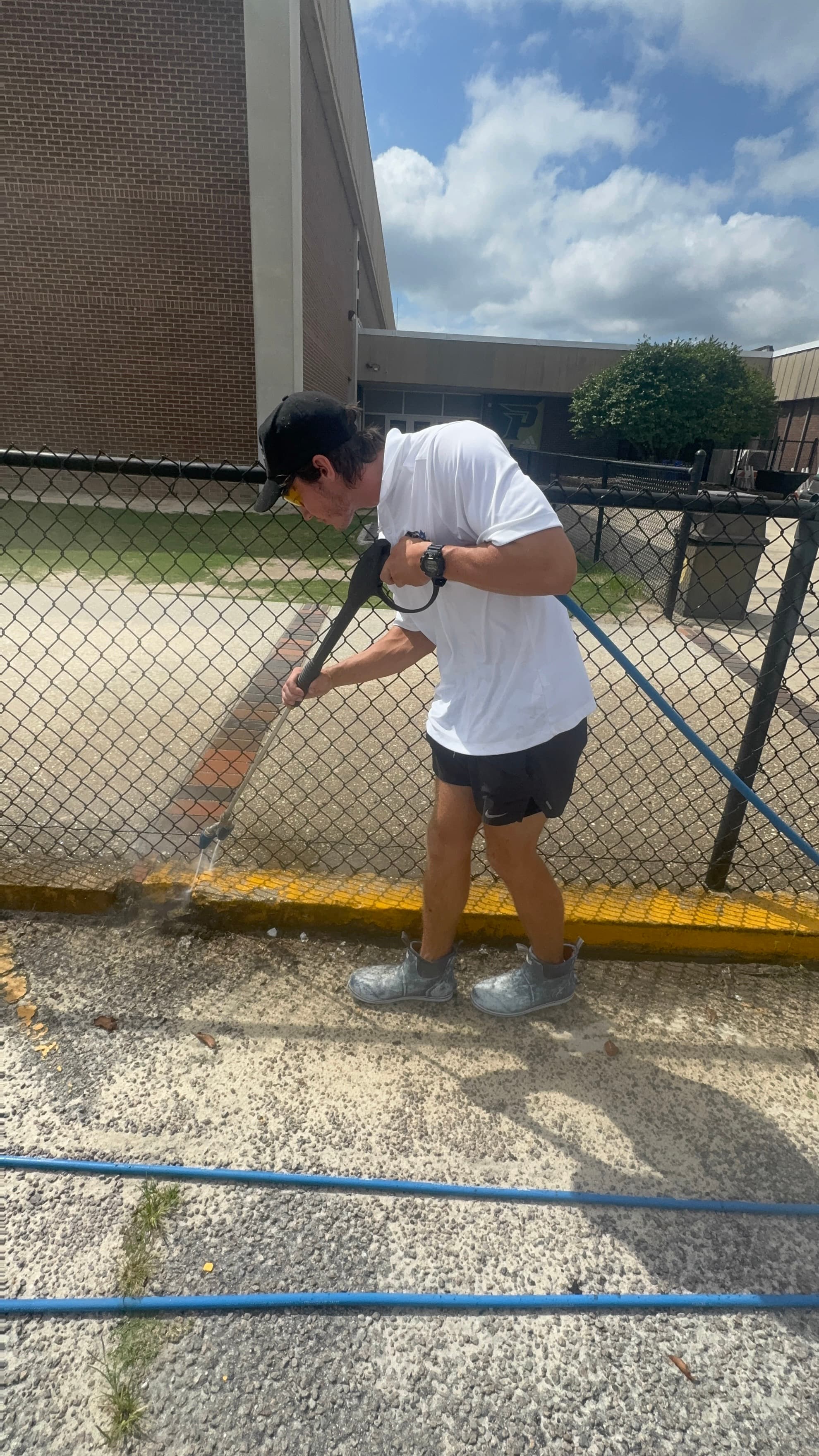 Commercial curbing pressure washed clean by Max Pressure in Fayetteville NC